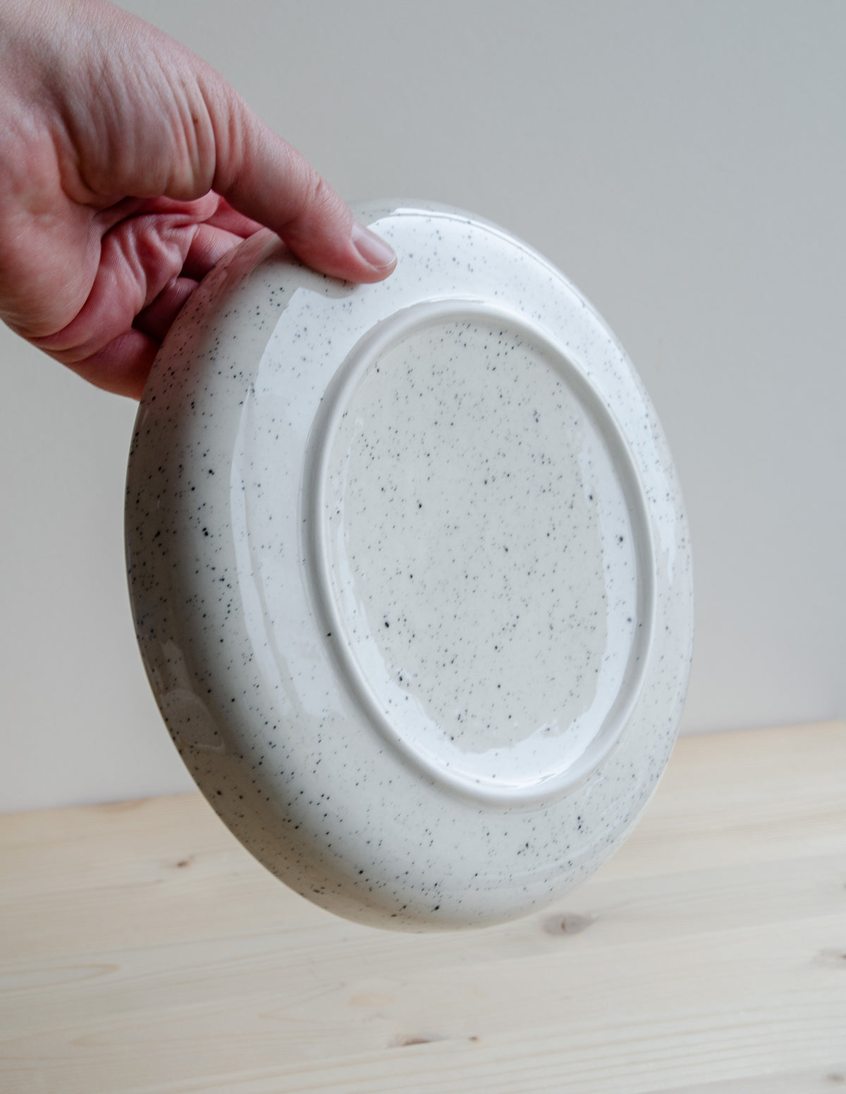 Deep plate with speckles and blue hearts